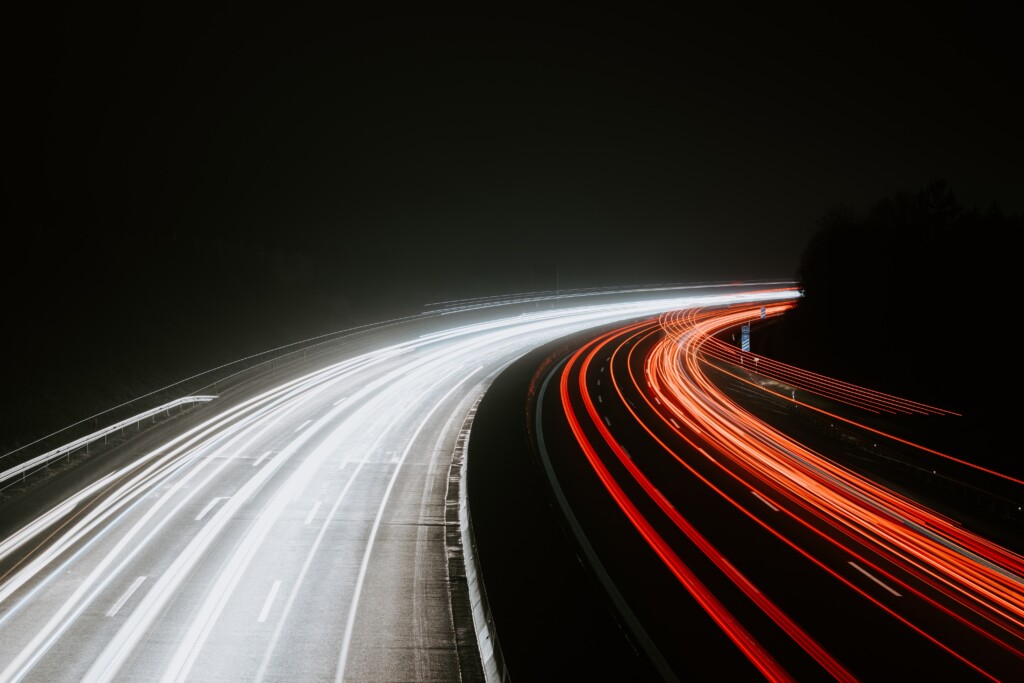 minimalist-light-trails-on-highway-at-night